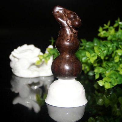 淘宝爆款越南沉香手把件 正宗沉水香木雕工艺品的特色与批发优势